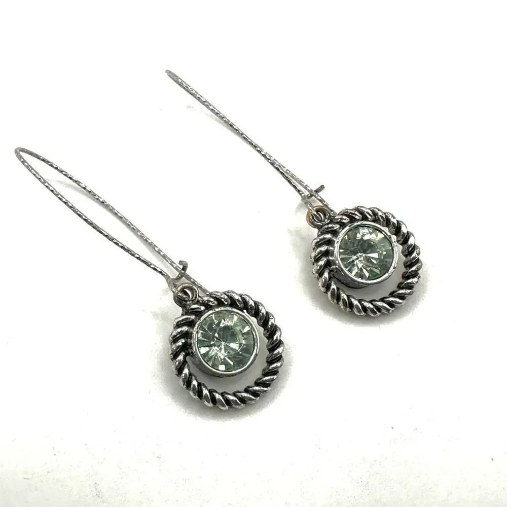 Silver tone green crystal dangling earrings